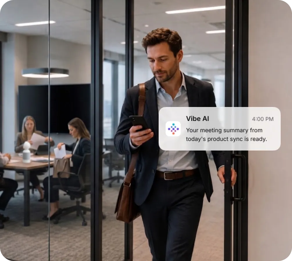 Businessman checking Vibe AI phone notification for meeting summary while leaving office conference room after product sync