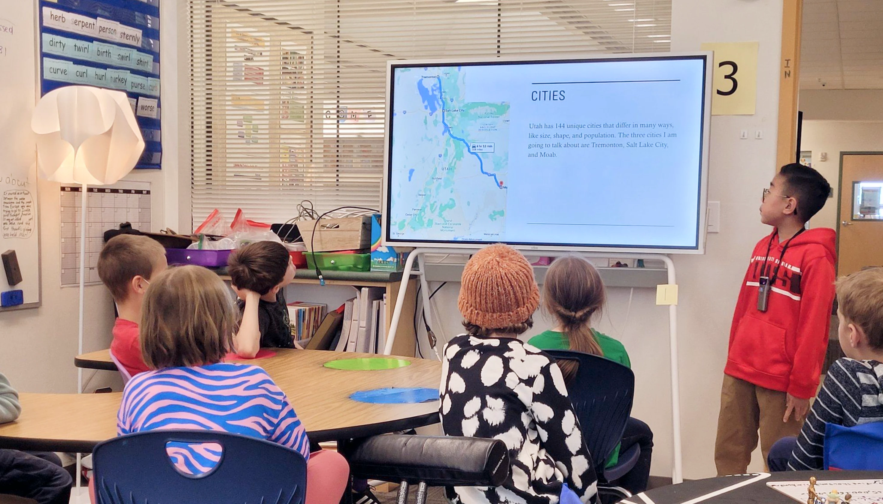 A class presenting on a Vibe Board