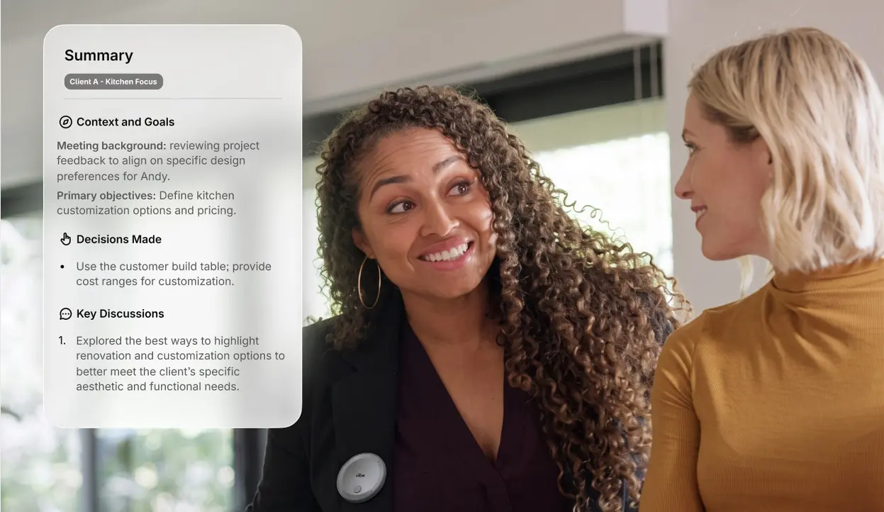 Vibe Dot worn in a meeting with AI summary card overlay