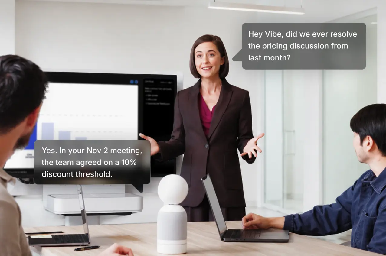 Vibe Bot AI conference camera recalling a past meeting decision about pricing during a live team meeting via voice query