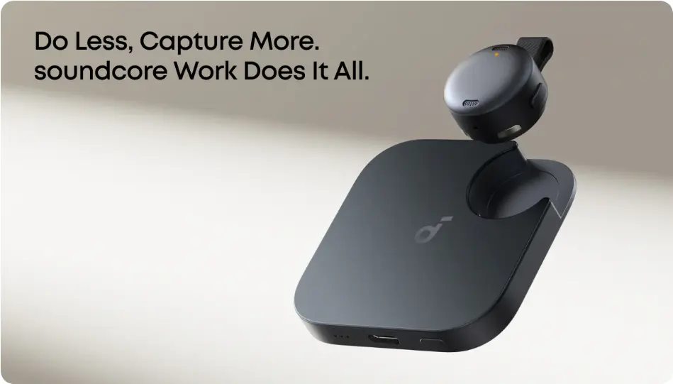 Soundcore Work AI recorder with clip attachment resting on its charging base