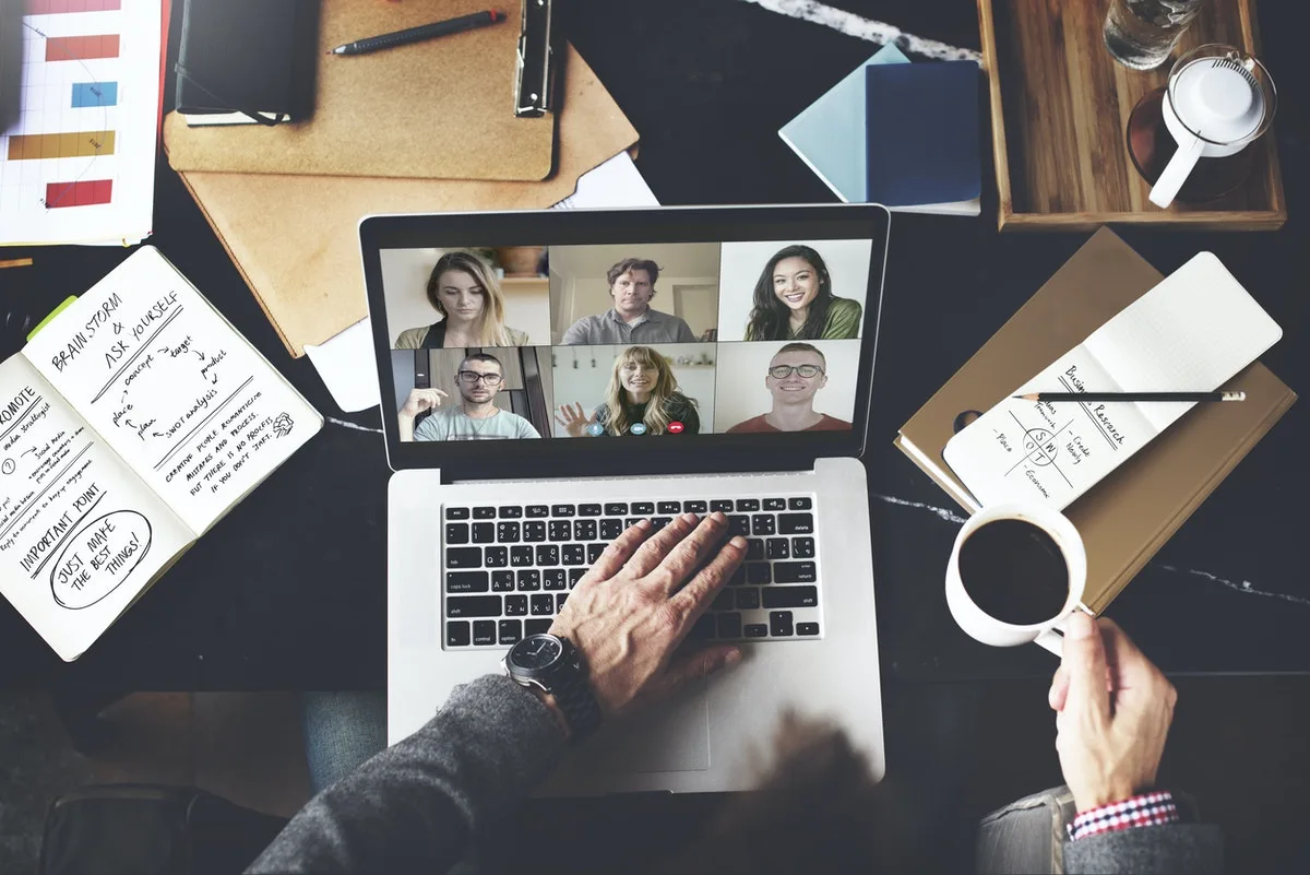 A man in a zoom meeting