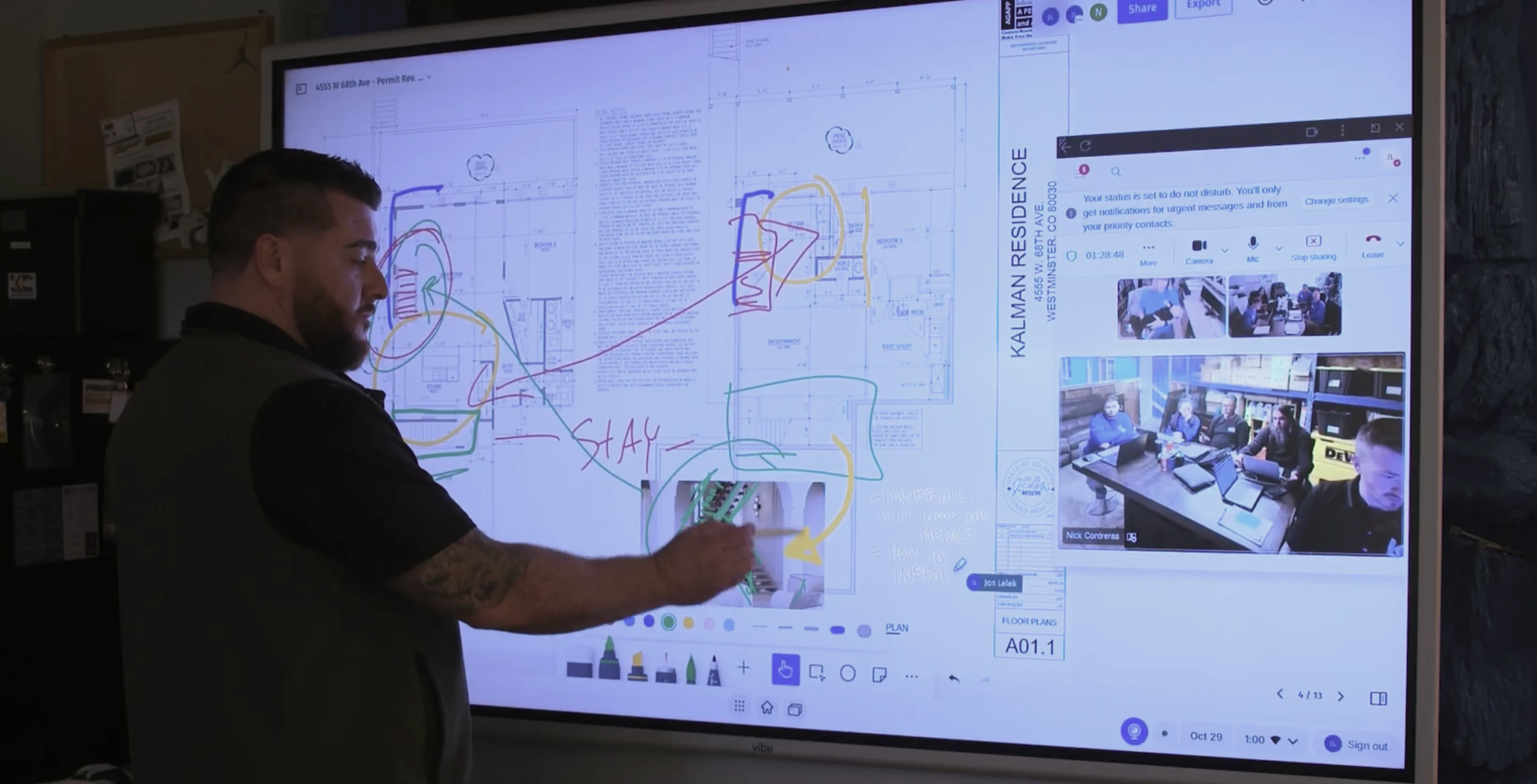 Kurtis Reeme annotating a construction blueprint on the Vibe Board while collaborating remotely with the project team via video call