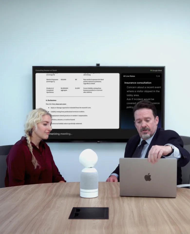 A huddle room, equipped with a Vibe smart whiteboard and a Vibe Bot