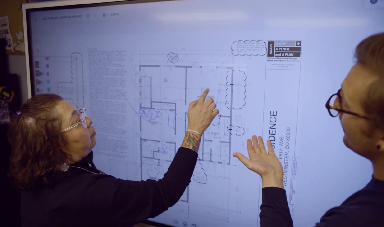 Client and K&D Development team reviewing a floor plan on the Vibe Board